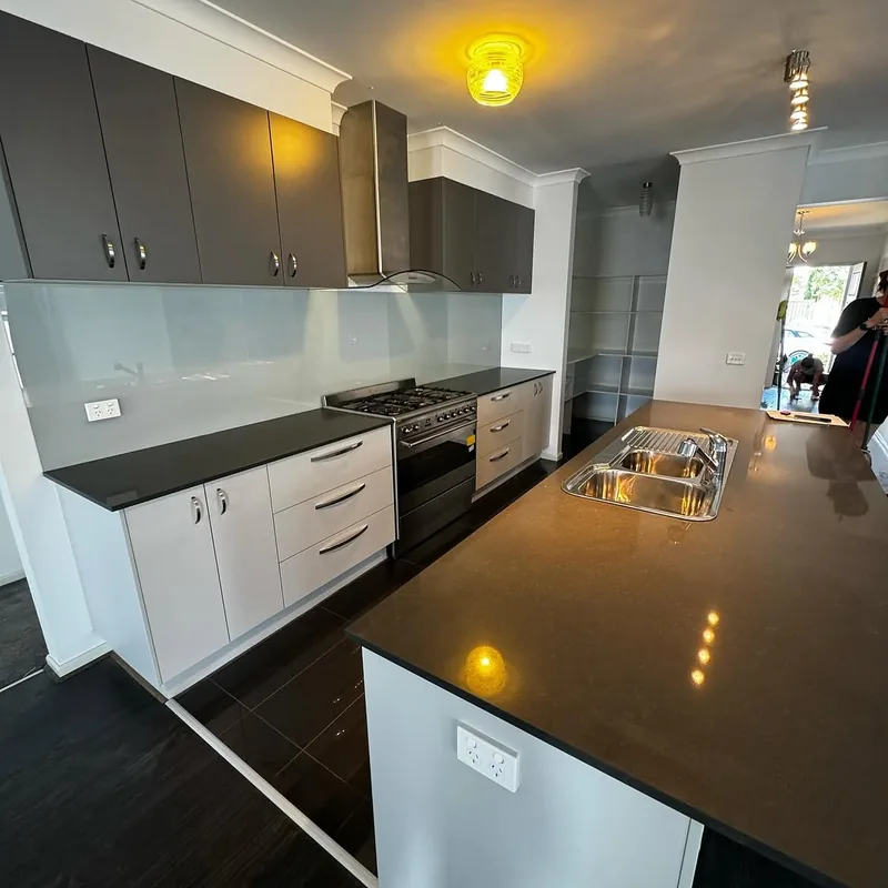 Cleared, presentation-ready kitchen after property preparation for sale